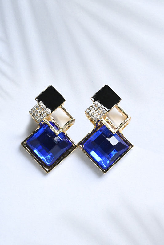 studs with sapphire and zircon details