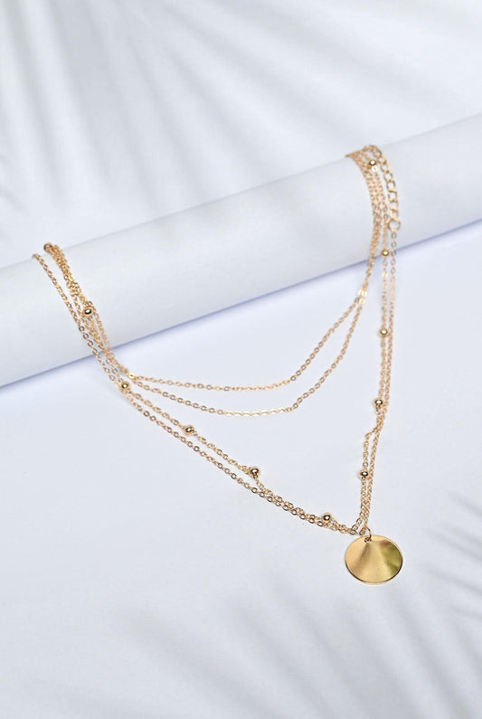 Multi layered gold chain with gold metal pendant necklace